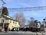 The DRRV Toys for Tots Train is resting in Downtown Rockaway while a jubilant crowd of people partake in the holiday festivities